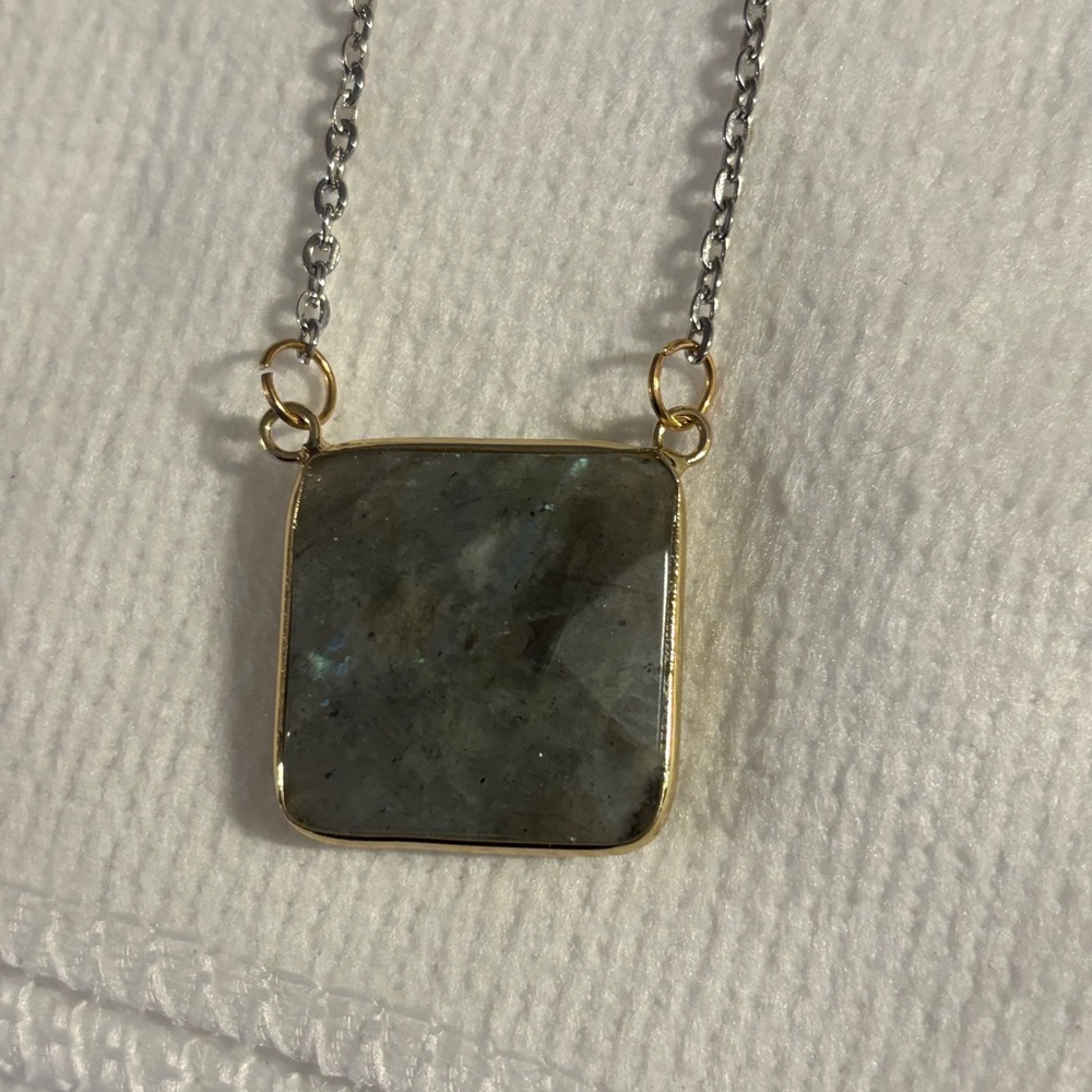 Elegant Gold and Silver Pendant Necklace